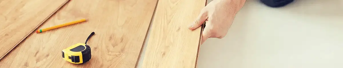 A professional installing wood flooring in Springfield, MO