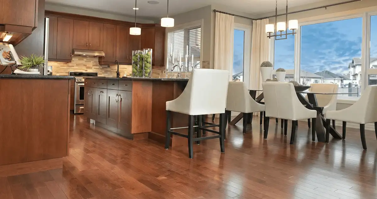 A modern kitchen with professionally installed wood flooring in Springfield, MO