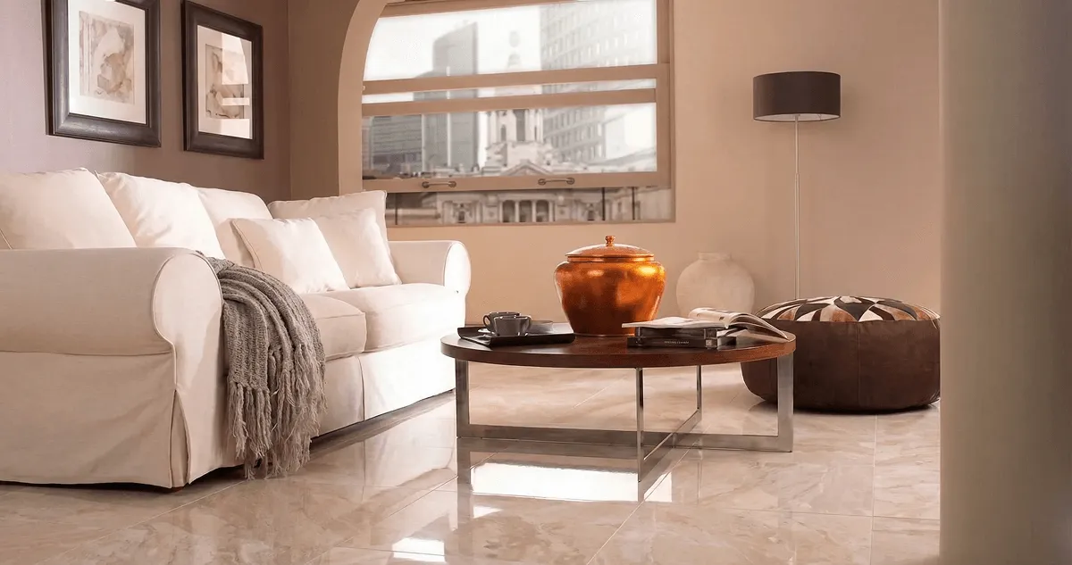 Modern living room with professionally installed marble flooring, a beige sofa, coffee table in Springfield, MO