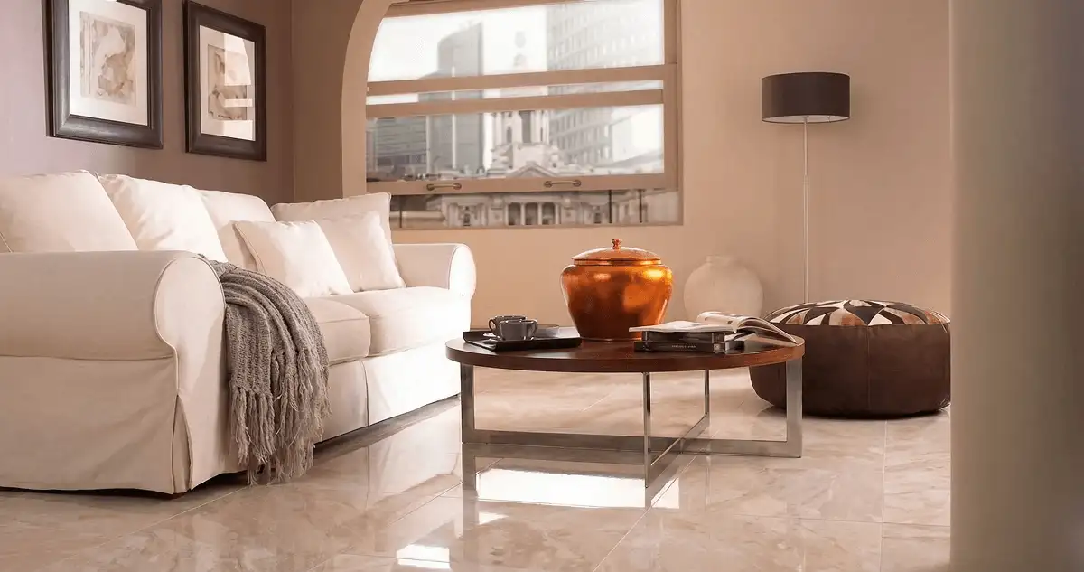 Modern living room with professionally installed marble flooring, a beige sofa, coffee table in Springfield, MO