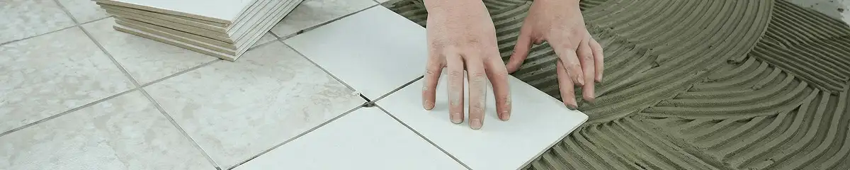 Professional installing white tile floors in Springfield, MO