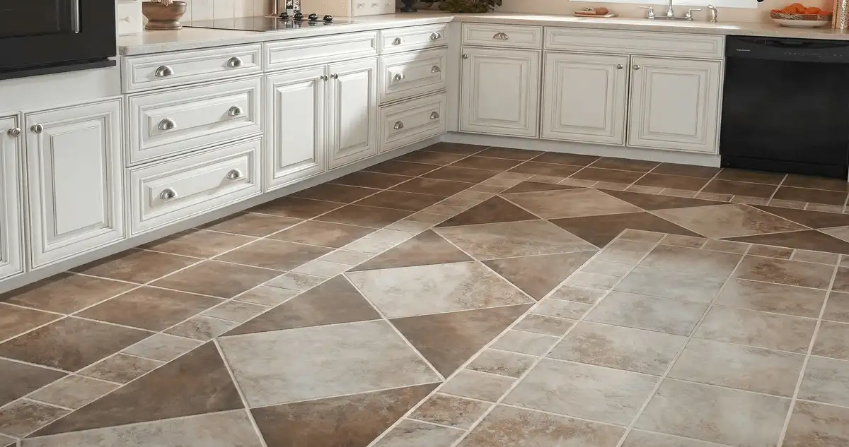 Kitchen with white cabinets and a professionally installed tile floor in Springfield, MO