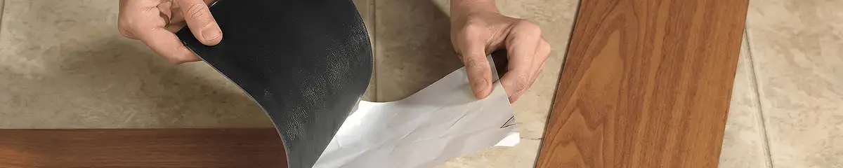 A professional installing vinyl flooring in Springfield, MO