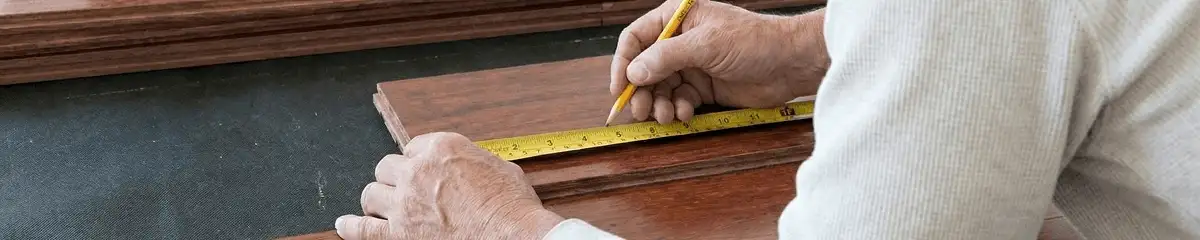 A professional installing wood flooring in Springfield, MO
